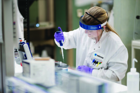 Labcorp scientist working in a lab